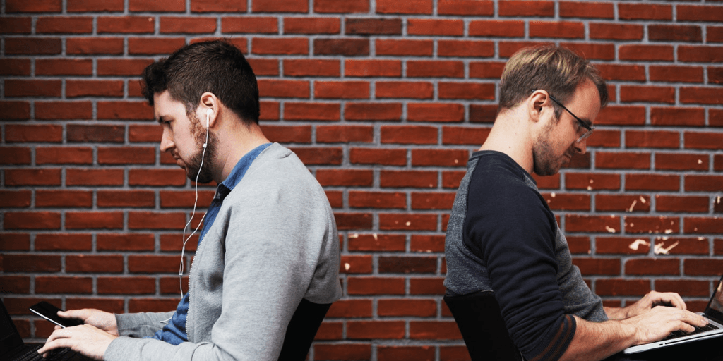 two employees angry at the other because of a toxic work environment